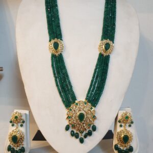 Handcrafted Green Rani Haar Set adorned with semi-precious pearls and gold-tone detailing.